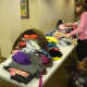 Westchester Day School students sort clothes donated as part of the clothing drive for Kid's Kloset in White Plains.