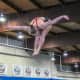Stamford's Kirsten Parkinson won two events for the Whirlwind Diving team of New Canaan at its invitational last weekend.