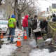 Neighbors in Mount Vernon eagerly observed clean up crews.