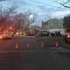 Emergency crews set up in the middle of Clinton Street on Monday evening. 