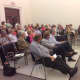 Residents filled the Town Center for a public hearing on a proposed parking permit system for the Washington Square are. 