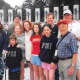 Leah Murphy, left, and her dad, John P. Lennon, front right,  anchor this picture taken at the World War II Monument in Washington, D.C, in 2004. 