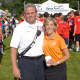 New Canaan Fire Department Capt. Mike Socci with Kathy Giusti