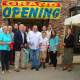 Westwood Flooring & Design Center employees celebrate the business' grand opening in Wilton.