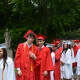 Members of Fox Lane High School's Class of 2014 proceed to their commencement.