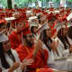 Fox Lane High School's Class of 2014 members applaud at their commencement.