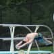 A Willowbrook diver does a back dive.