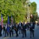 A color guard marches in the parade.