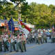 Marchers in the fire department parade in Mount Kisco.