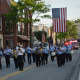 Marchers in Mount Kisco's fire department parade.