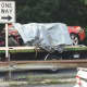 The vehicle involved in the fatal crash is placed on a tow truck Wednesday morning. 
