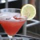 Dolphin's Charlie Parker Punch is made with SKYY grape vodka, pineapple juice and cherry juice, shaken and served in a highball glass garnished with a lemon wheel.
