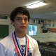Liam Smith of Wilton wins the gold medal in the Nutmeg State Games in the Fencing Cadet category. 
