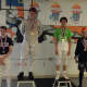 Liam Smith of Wilton takes silver and accepts medals with the others in the Nutmeg Games 2014 Junior U20 Fencing category. 