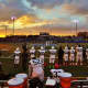 The setting sun makes for a beautiful backdrop at the Section 1 football championships at Mahopac High School in November 2013.