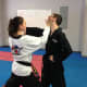 UMAC Ardsley instructors show a Taekwondo skill.