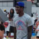 New York Knick Iman shumpert watching kids during a drill at his  clinic.