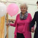 Atria Darien Assisted Living residents were escorted at the Pretty in Pink fashion show by Darien High School students. 
