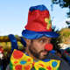 A local resident dresses up as a clown. 