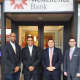 From left: Lonnie Speller, head teller; Glen Fernandez, asst branch manager; Daniel Alzarez, customer service; Justin Maneen, VP, Branch Manager
