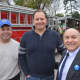 Left to right: Bedford Village Lions Club President George Fernandez, parade Chair Mark Boyland and Bedford Supervisor Chris Burdick. The three pose for a picture following the parade.