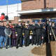 Firefighters pose for photos at the Croton Falls firehouse groundbreaking.