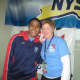 Nicole Parry with Mamaroneck swim coach Cathleen Ferguson after her relay race and before her individual sprint races.