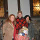 Katonah's Rob Siegel, center, was among the raffle winners for the local holiday celebration.