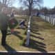 Darien volunteers lay wreaths and pause to reflect during the Wreaths Across America ceremony.