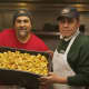 Chicken Joe owner Joe Marini, left, shows off a tray of his popular chicken nuggets.