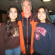Ellie and Karen Seid, All-America honorees, with Mamaroneck field hockey coach John Savage.