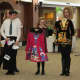Denis Jr., Kaitlyn and mom Heidi show and assortment of dresses traditionally worn in Irish Dance Competitions.