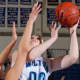 Wilton's Erica Meyer goes up for a shot during a game against Stamford.
