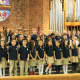 Students from The Chapel School's prep choir sang as part of the celebration.