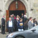 Mourners leave Holy Name Of Mary church following Lacey Carr's funeral.