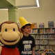 The new children's room at the Lewisboro Library had a "Curious George" theme on Saturday.