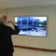 A time-lapse video of the 14-month construction project was played on eight large screens throughout the new WESTMED building for patients and other visitors on Wednesday.