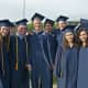 Weston High School students celebrate at commencement ceremonies Friday afternoon.