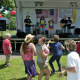 Visitors dance to live music at Sunday's Ice Cream Social.