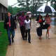 Umbrellas are a popular item as the rain moved the Wilton High graduation ceremonies indoors. 