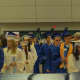 With their diplomas in the foreground, Dobbs Ferry High School seniors file into the gym during the graduate processional on Friday to "Pomp and Circumstance." 