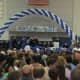 Diplomas are awarded to Dobbs Ferry High School graduates as a packed gym of family and friends look on. 