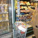 Sheila Whitney, of Greenburgh, stocks up on canned goods at the A&P Supermarket in Greenburgh Shopping Center.