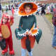 Brothers CJ Young, 6, and Arthur Young, 10, went to get candy dressed as a dragon and a venus flytrap.