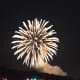Fireworks explode above the Danbury Fair Mall and Danbury Airport on Thursday evening. 