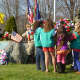 A local Girl Scout troop lays a wreath Sunday at the Somers Veterans Memorial.