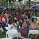 A nice crowd enjoys the music at Columbus Park in Stamford.