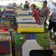 Children's books are lined up almost as far as the eye can see at Sunday's sale. 