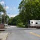 A passing train at the grade crossing in downtown Katonah.