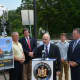 New Castle Supervisor Rob Greenstein speaks at a Katonah press conference about grade-crossing safety.
